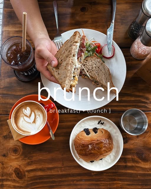 Brunch spread at The Hideout Café — sandwich, latte, pastry and iced coffee